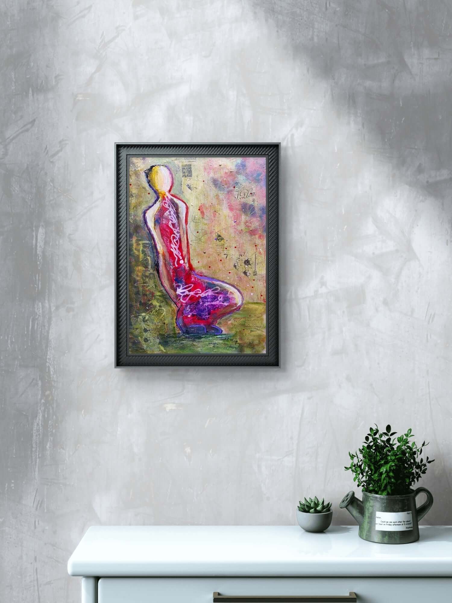 This mixed media artwork features a stylized, abstract figure outlined in bold black, seated against a vibrant and textured background of pinks, purples, greens, and whites. The composition includes layered text, floral motifs, and spontaneous mark-making, creating depth and movement.