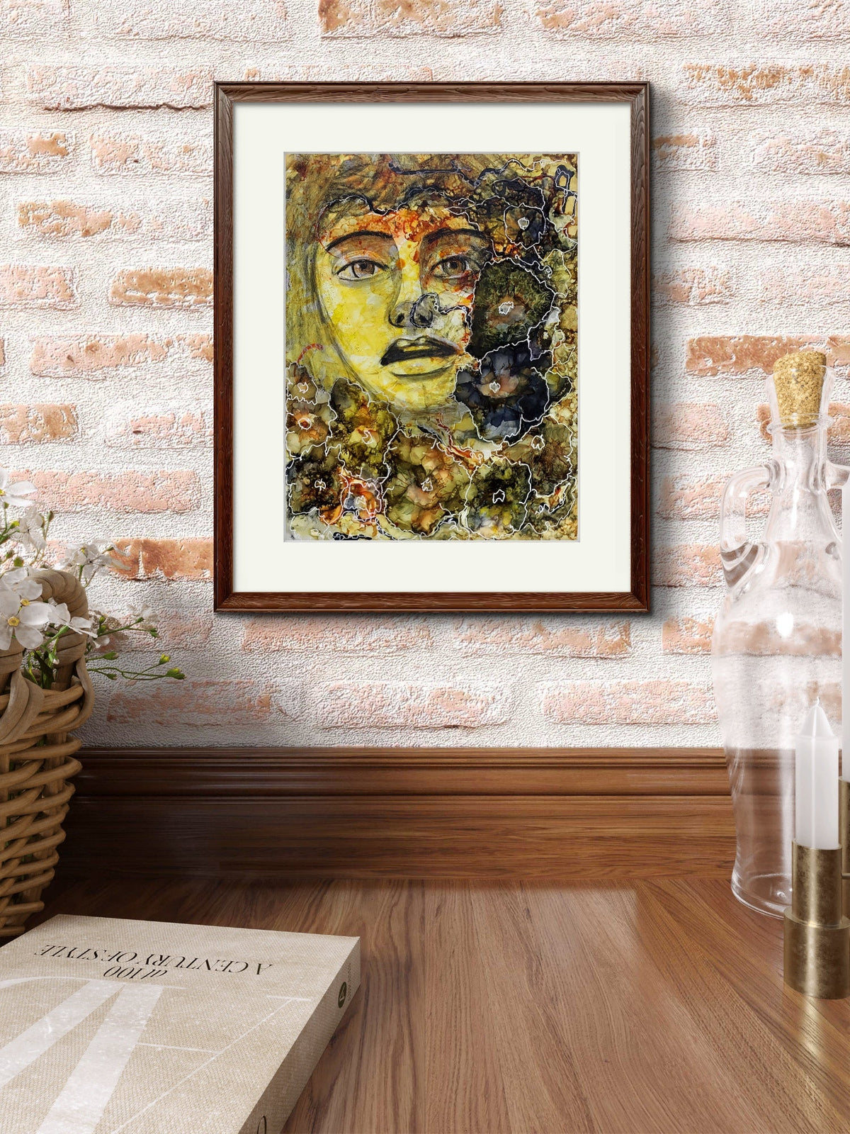 “Mixed-media portrait titled The Interwoven Connection showing a face merging with abstract botanical and textured forms, outlined with white organic lines in earthy brown, green, yellow, and black, framed view.”