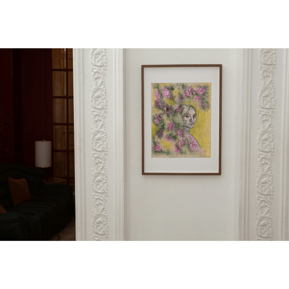 “Painterly portrait titled Petals of Thought showing a woman with light hair surrounded by pink and purple blossoms, green foliage, and a warm yellow background, framed view.”