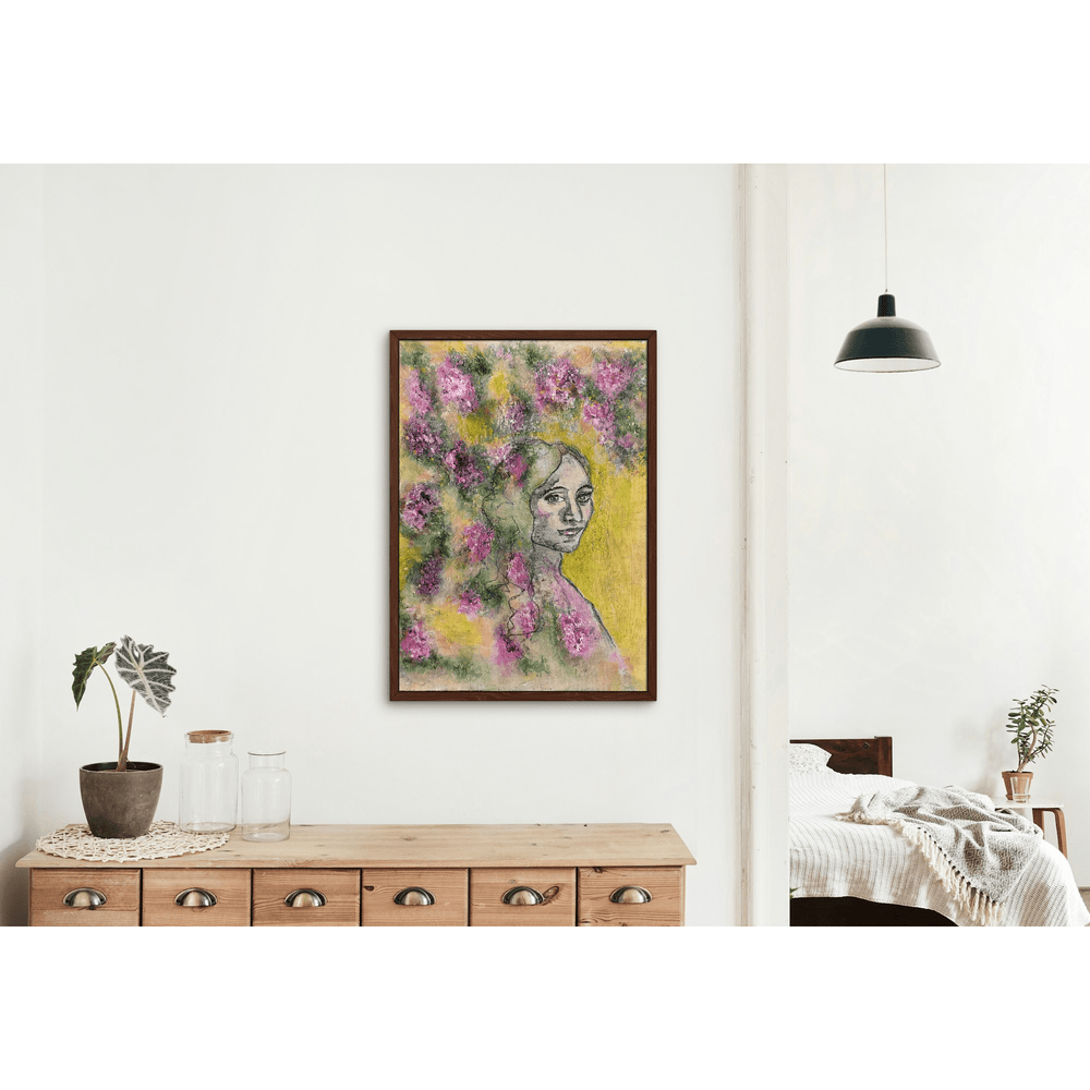 “Painterly portrait titled Petals of Thought showing a woman with light hair surrounded by pink and purple blossoms, green foliage, and a warm yellow background, framed view.”