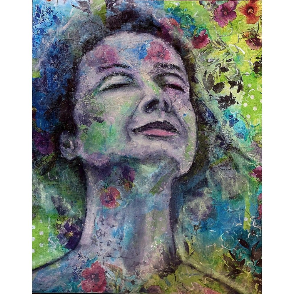 A vibrant portrait of a smiling woman with floral patterns blending into her face and background, creating a serene and joyful atmosphere. Trudie Averett Art - Potchefstroom.

