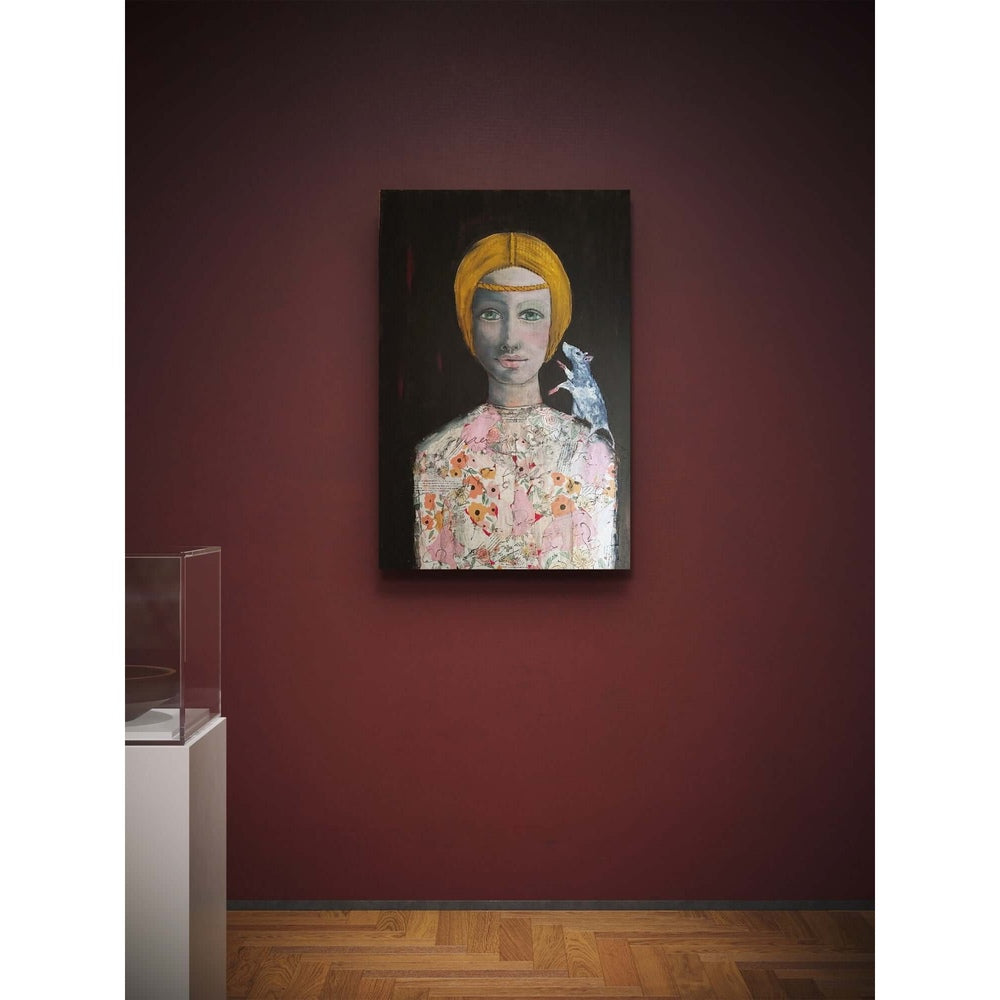 The artwork depicts a stylized female figure with green eyes and a yellow headpiece, wearing a floral-patterned garment. A small white mouse sits on her shoulder, adding a subtle narrative element. The dark background contrasts with the soft colors, highl