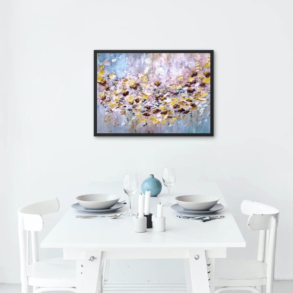 Abstract painting with vibrant splashes of pink, yellow, red, and white resembling a field of flowers against a soft blue and pastel background.
